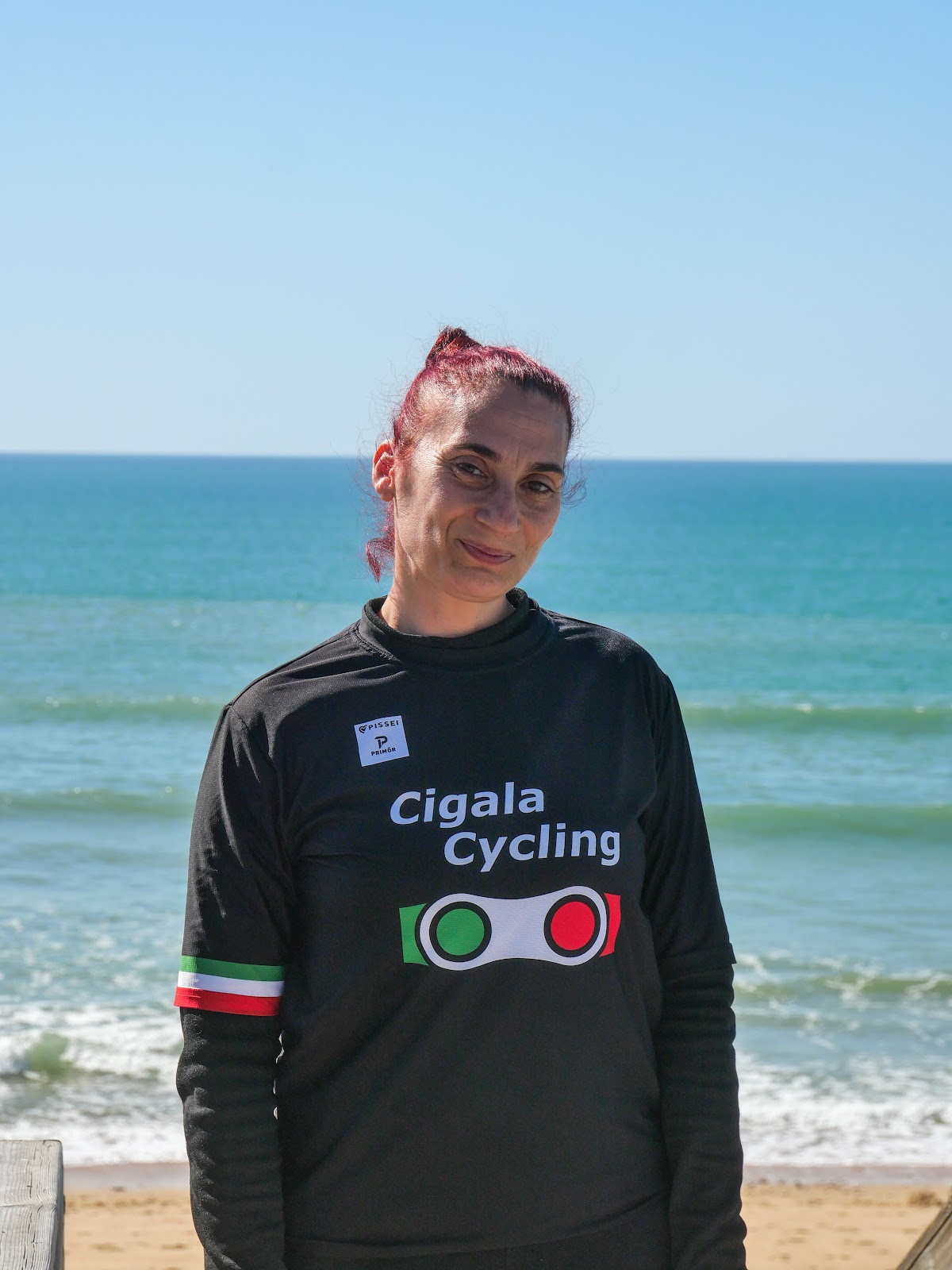 Woman in black cycling shirt - Cigala Cycling Tours